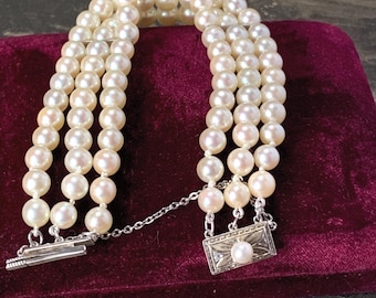 Vintage Mikimoto Pearl Bracelet: 3-Strand Akoya Pearls, Silver Clasp