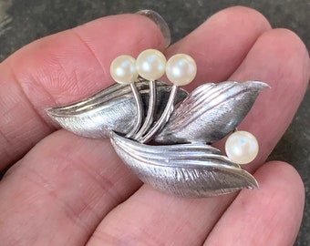 1950s Mikimoto Pearl Brooch. 6.4 grams Sterling silver 4 akoya 5mm pearls in a floral design from Japan