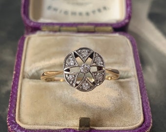 Diamond engagement ring. 18ct yellow gold and platinum celestial star design making this a beautiful and unique art deco ring