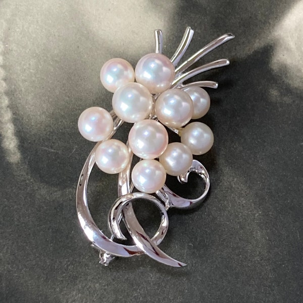 Mikimoto Akoya Pearl brooch made from silver and set with 11 fabulous Japanese Akoya Pearls