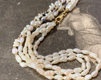 Vintage multi strand pearl necklace. 14ct yellow gold clasp and gold beads with white and grey pearls