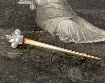Gold Mikimoto diamond pearl sword brooch. A beautiful vintage keepsake gift for a loved one