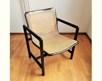 Modern cane lounge chair / Branko Uršič for Stol Kamnik / 1980s Yugoslavia wood and cane net armchair