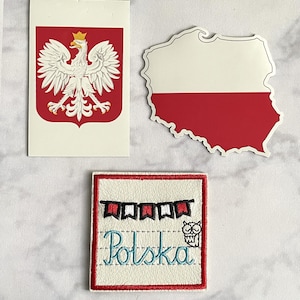 May include: Three Polish-themed items: a rectangular sticker with the Polish coat of arms, a sticker in the shape of Poland's map with the Polish flag, and a patch with the word "Polska" and an owl.