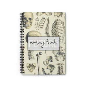 May include: A spiral bound notebook with a beige cover featuring a vintage anatomical illustration of bones and a skull. The text "x-ray tech" is printed on the cover.