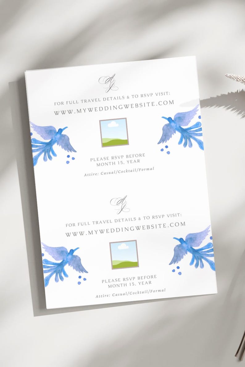 Puede incluir: Una invitaci&oacute;n de boda blanca con p&aacute;jaros azules de acuarela y una peque&ntilde;a imagen de un paisaje. El texto dice "FOR FULL TRAVEL DETAILS & TO RSVP VISIT: WWW.MYWEDDINGWEBSITE.COM PLEASE RSVP BEFORE MONTH 15, YEAR Attire: Casual/Cocktail/Formal"