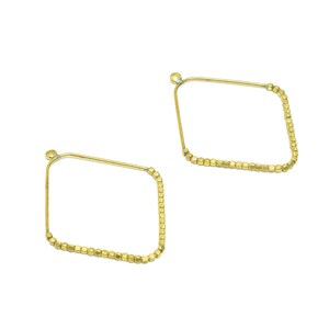 May include: A pair of gold-toned hoop earrings with a square shape. The earrings are made of small, round beads.