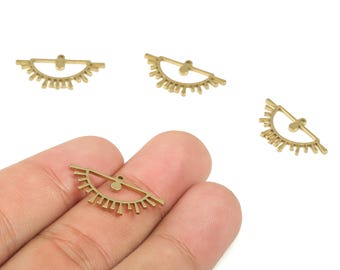 May include: Gold-colored metal charm pendants in a half-sun design. The pendants have a small loop at the top and a series of vertical lines along the bottom edge. These charms are ideal for jewelry making and crafting projects.