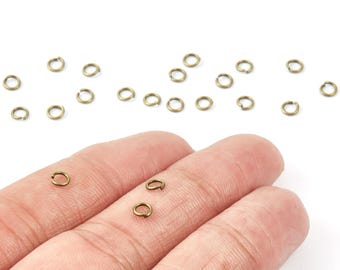Anneaux ouverts en laiton - 4 x 0,7 mm - Plaqué bronze antique - Apprêts pour boucles d'oreilles - Non soudés - Fournitures pour bijoux - PP1633AB