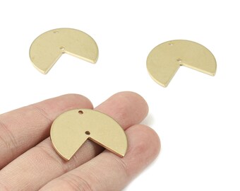 May include: Three brass-coloured, semi-circular metal charms with a cut-out section. One charm is held in a hand. Each charm has two small holes for attaching. Ideal for jewellery making or craft projects. Measurements in cm.