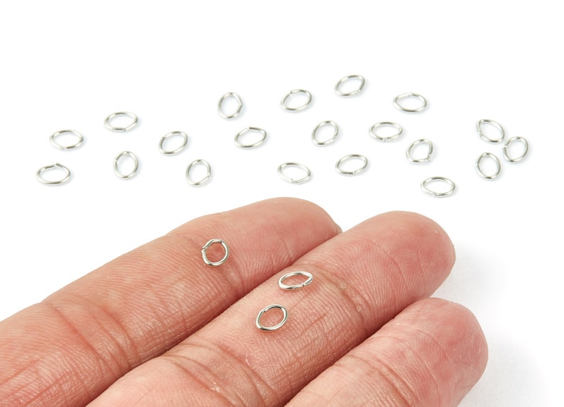 Silver Tone Plated Jewelry Supplies Brass Open Jump Rings PP1564S Brass Open Jump Rings 5x4x0.7mm