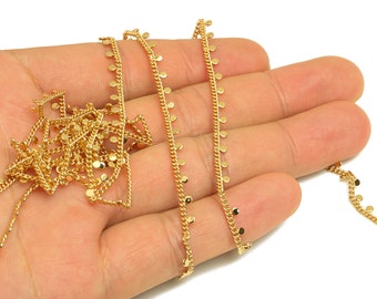 May include: Gold chain with small round discs, perfect for jewelry making or adding a touch of sparkle to crafts.