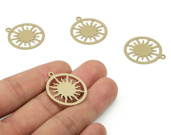 May include: Four gold-colored sun charms. Each charm features a sun design within a circular frame, with a small loop at the top for attachment. The charms are shown against a white background.