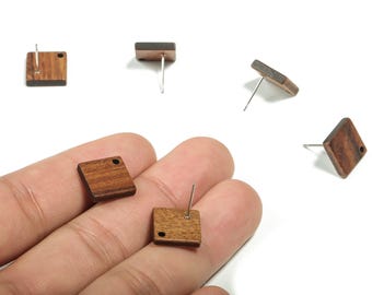 May include: Wooden square stud earrings with a dark brown finish. The earrings have a small hole and a silver post. The earrings are shown in multiple views.