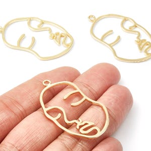 Face Shaped Charm – Gold Tone Zinc Alloy Pendant for Necklace, Earrings (43.7x25.7x1.5mm) ZZ1296 image 1
