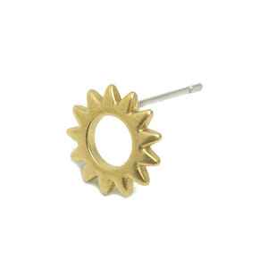 May include: A gold-coloured sun-shaped earring with a small hole in the centre. The earring has a silver post.