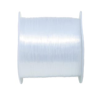 Könnte beinhalten: Eine Spule mit transparentem elastischem Faden zum Schmuckmachen.