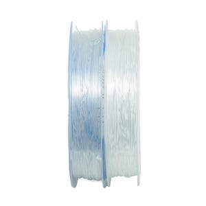 May include: Two spools of clear fishing line on a white background.