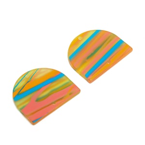 May include: A pair of colorful, semi-circular resin earrings with a marbled pattern in shades of yellow, orange, pink, blue, and green.