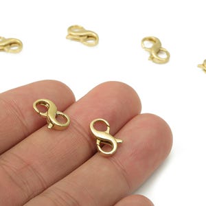 Chiusure a doppio moschettone in ottone – Chiusura a moschettone in ottone grezzo – Chiusura a moschettone infinito – Chiusura a grilletto – Per la creazione di gioielli - 12,9x8,5x3,2 mm-PP5235