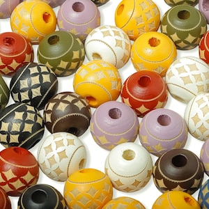 May include: A selection of brightly coloured wooden beads, including yellow, red, green, and purple. Each bead has a geometric pattern and a central hole. Ideal for jewellery making or crafts. Measurements are in centimetres.