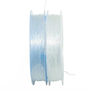 May include: Two spools of clear fishing line, wound on blue plastic spools.