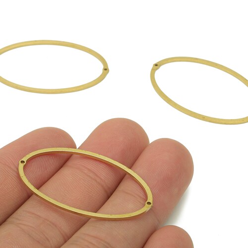 Conector ovalado de latón para pendientes - Pendiente ovalado de latón sin tratar - Con 2 agujeros - Conector - 39,6 x 23,9 x 1 mm - PPZ0204
