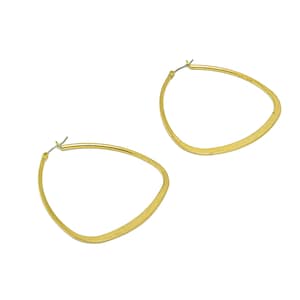 May include: A pair of gold-toned hoop earrings with a slightly curved, oval shape.