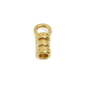 May include: Gold-toned metal end cap with a loop at the top and a textured design. The end cap is about 1 inch long.