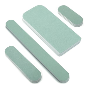 May include: Set of four green nail files in different sizes. The files are made from a coarse grit material and are ideal for shaping and smoothing nails.