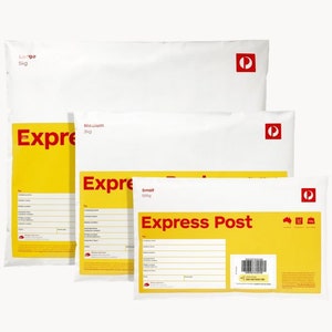 May include: Three white mailing envelopes with yellow and red accents. The largest envelope says "Express Bag". The middle envelope says "Express Bag". The smallest envelope says "Express Post" and has a barcode and a small Australian flag.