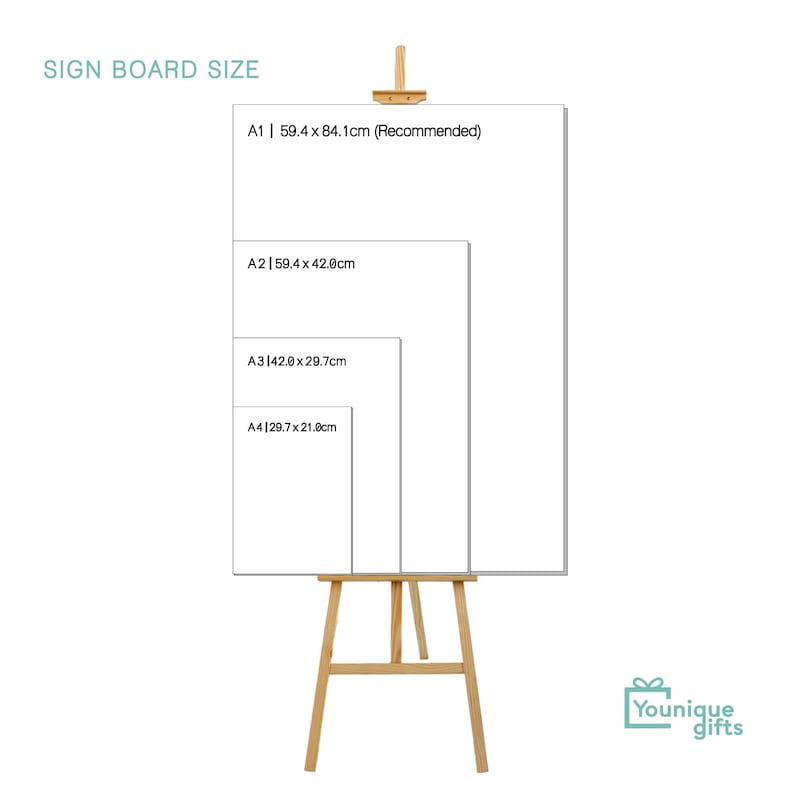 May include: A wooden easel displaying a white sign board with size options: A1 (59.4 x 84.1cm), A2 (59.4 x 42.0cm), A3 (42.0 x 29.7cm), and A4 (29.7 x 21.0cm). The text "SIGN BOARD SIZE" is at the top. The logo "Younique gifts" is in the bottom right corner.