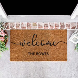 Personalised Natural Coir door mat printed in black and cursive welcome letter