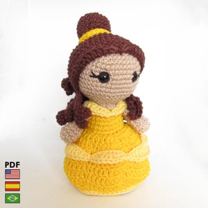 May include: A set of three ceramic canisters with lids, featuring a geometric pattern in shades of blue, white, and grey. The canisters vary in size, with the largest approximately 20 cm tall.