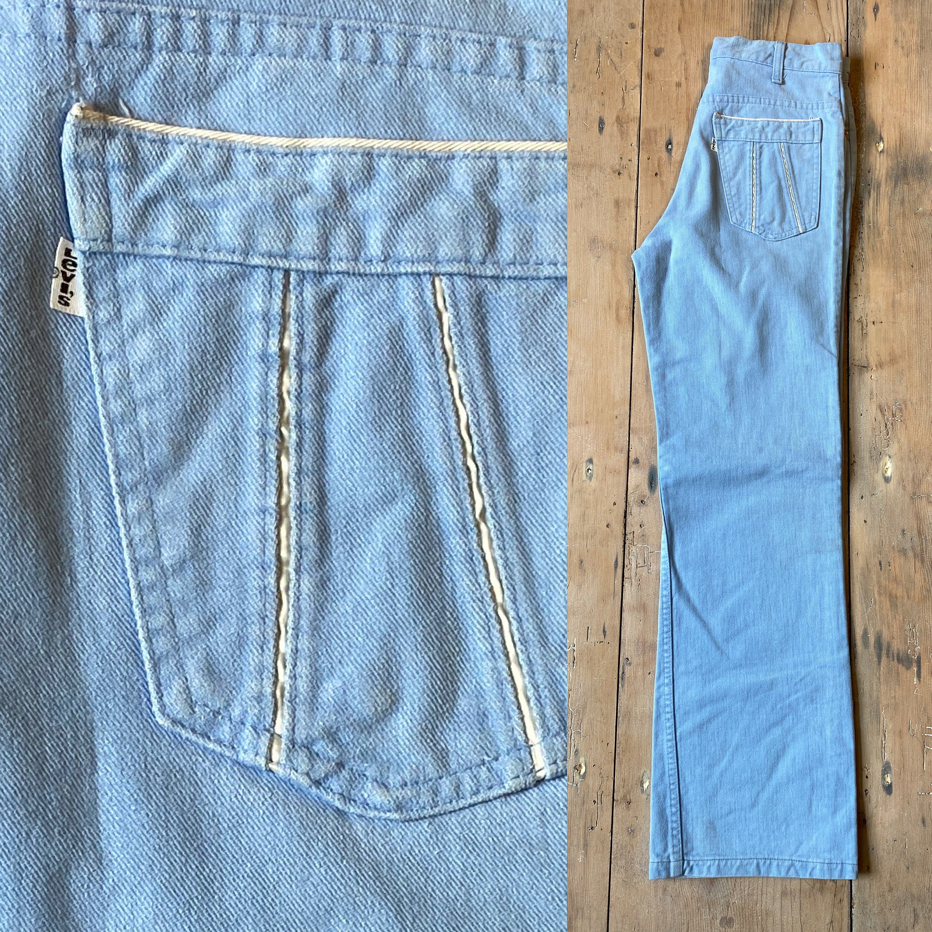 Jeans with best sale w on pocket