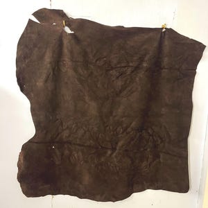 pelle scamosciata marrone, circa 13 mq vedi foto