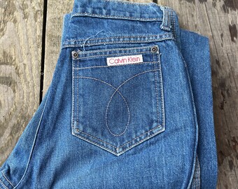 Vtg 25”x 32.5” 80s Calvin Klein high waisted blue jeans made in USA