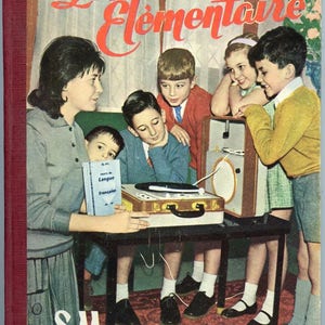 May include: Vintage book cover with the title "Le Français Élémentaire" in red script. The image shows a group of children and a woman gathered around a record player. The book is a French language learning resource.