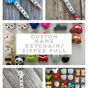 May include: A collection of colorful silicone keychain and zipper pull charms. The charms include a unicorn, a rocket, a panda, a fox, a motorcycle, a car, a popsicle, a heart, a mouse, an owl, a teddy bear, a strawberry, a train, a llama, a dinosaur, and a turtle. The charms are all made of silicone and are perfect for adding a touch of personality to your keys or backpack.