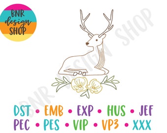 May include: Line art illustration of a white deer with large antlers sitting down with flowers behind it. The text "DST EMB EXP HUS JEF PEC PES VIP VP3 XXX" is below the deer.