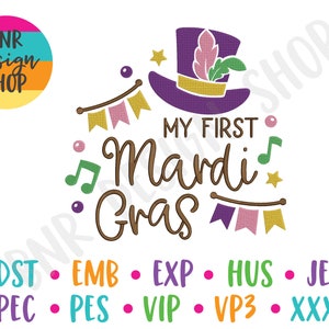 May include: A purple, green, and gold Mardi Gras themed design with a crown and the text "My First Mardi Gras".