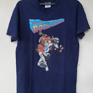 Maglietta vintage anni '90 "Blue Monday The Kids Are Alright" del fumetto Chynna Clugston Flores, serie manga e cartoni animati americani "Bleu and Clover New Order"