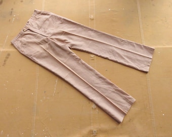 May include: A pair of light brown checkered pants with a straight leg.