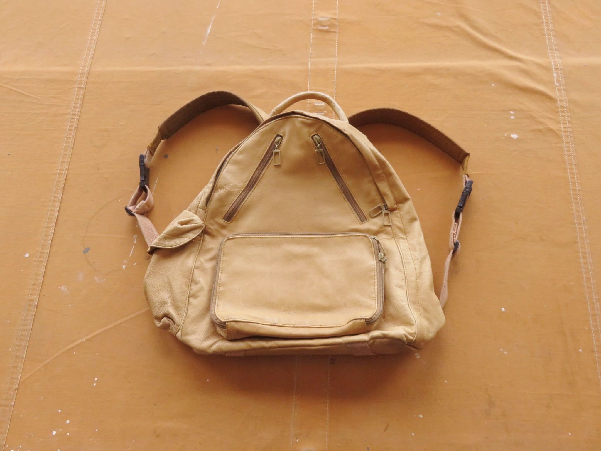 Cream Black Vegan Leather and Knit Material Backpack