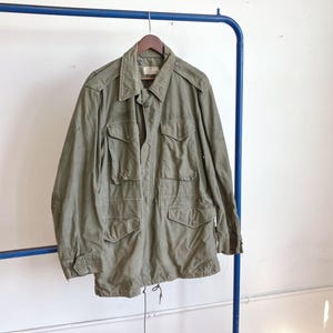 Medellång 50-tals sliten amerikansk armé M-51 fältjacka / militärrock parkas bomull 7