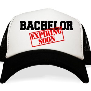 May include: A white and black trucker hat with the text "Bachelor Expiring Soon" in red.