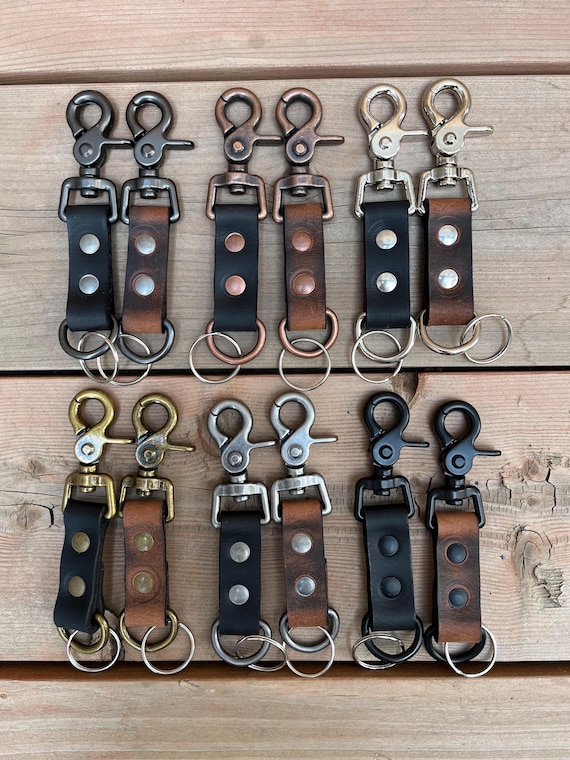 Upcycled leather keychain with a built-in scissor/clip holder — practical EDC craft with a sustainability story and real handmade character.