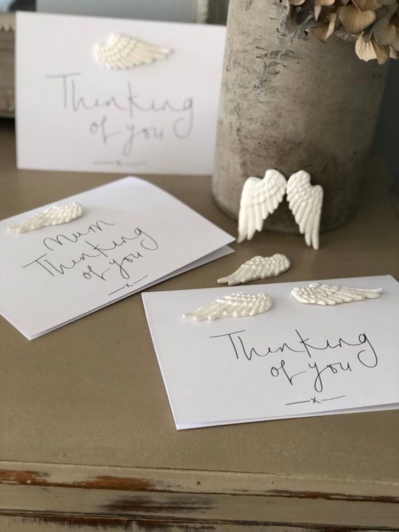 Handmade clay feather keepsakes