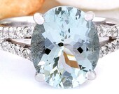 Aquamarine and diamond ring in 14k white gold