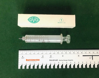 Vintage glass syringe "GVG" 10 ml made in GDR.